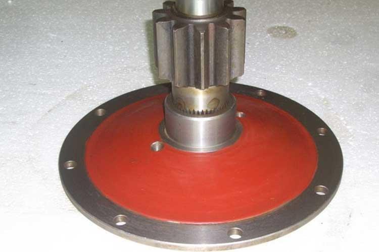 Pinion shaft and flange plate